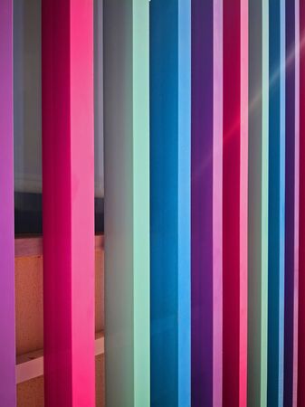 Pastel coloured wooden decoration of building, Portugal