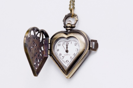 The manual old-time watch. Heart shape.の写真素材