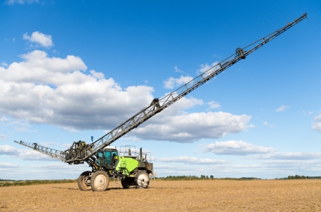 Self propelled sprayer in a Lithuanian field 