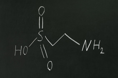 Chemical formula of taurine on a blackboardの写真素材