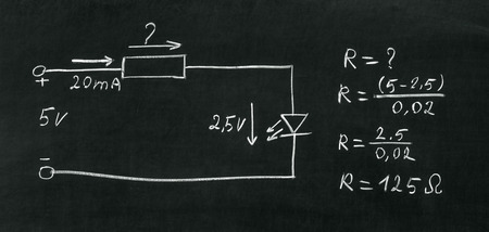 On blackboard painted with chalk electrical scheme  Calculate the resistor の写真素材
