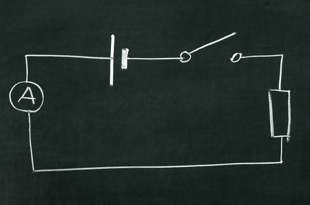 The electrical diagram drawn on a blackboard with chalkの写真素材