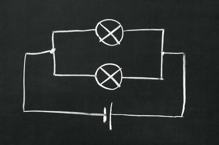 The electrical diagram drawn on a blackboard with chalkの写真素材