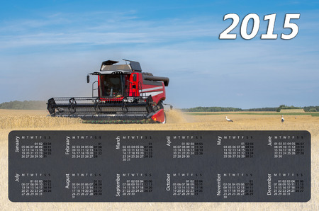 Calendar for 2015. Harvesting combine at the rye fieldの写真素材