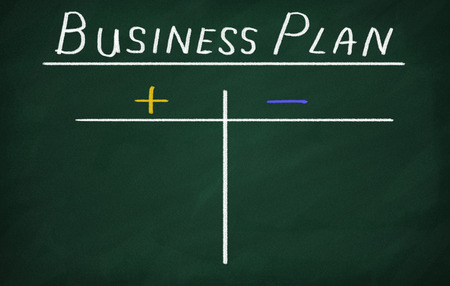 Business plan on the blackboard. Plus and minus.の写真素材