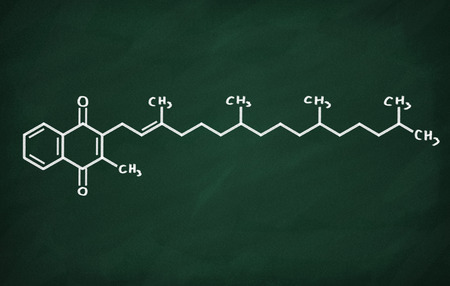 Structural model of Vitamin K on the blackboard.