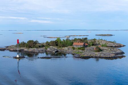House on top of a cliff in the Stockholm Archipelago, Stockholm Swedenの写真素材