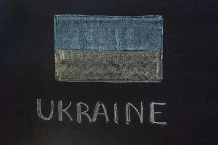 Word "Ukraine" writed on blackboard with chalkの写真素材