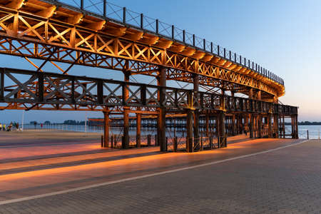 HUELVA, SPAIN - APRIL 18, 2022: Historic Rio Tinto Pier by sunset in Huelva, Andalusia, southern Spainのeditorial素材