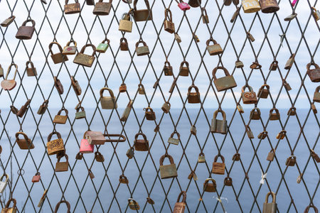 Dubrovnik, Croatia - 8 July 2022: the locks that the lovers have attached to the bridgeのeditorial素材