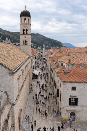 Dubrovnik, Croatia - 8 July 2022: One of the main old town streets. Cloudy day.のeditorial素材
