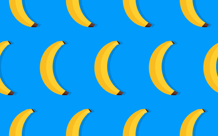fruit pattern of yellow bananas on blue background.のイラスト素材