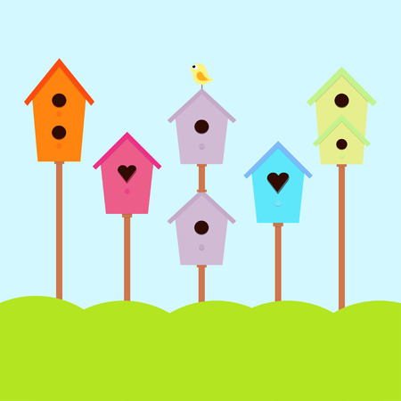 a set of cute bird houses and bird in a row, collection of colorful birdhousesのイラスト素材