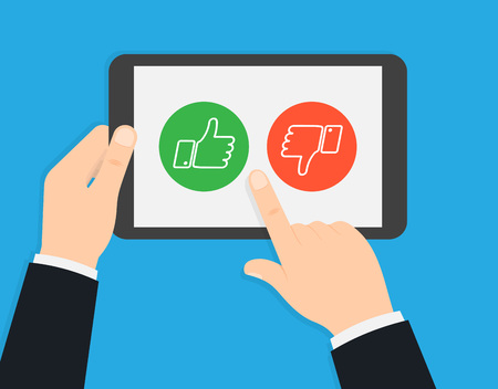 Rating on customer service. Voting via tablet. Hand holding and pointing to a tablet with like and dislike on the screen. Vector illustrationのイラスト素材