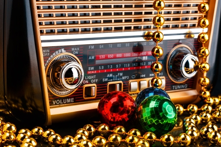 Radio receiver in retro style with christmas decorationsの写真素材