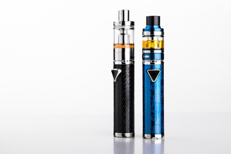 electronic cigarettes or vaping devices on white background