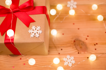 A gift with a red bow. Snowflake.の写真素材