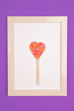 Lollipop in the form of a heart.の写真素材