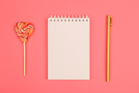 Place for writing with a pen on a pink background.の写真素材