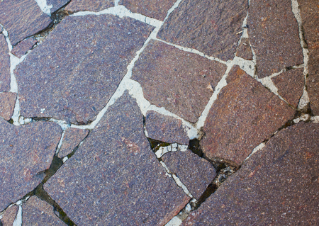 Paving slabs.Granite paving slabs.Stone road.の写真素材