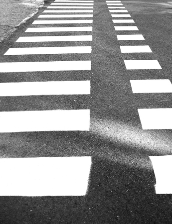 Deserted pedestrian crossing unusual shape in the park area city.の写真素材