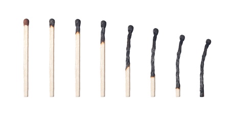 burned matches on white background