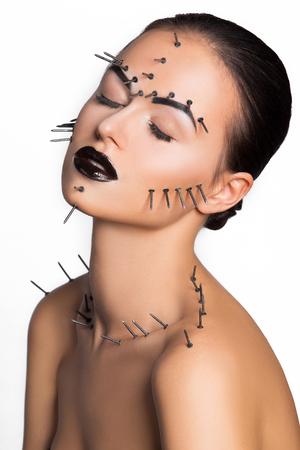 Metall nail on face makeup femaleの写真素材