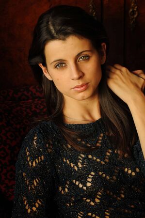 Beautiful young brunette girl wearing hotの写真素材