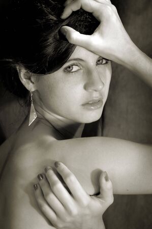 Beautiful young brunette girl's faceの写真素材