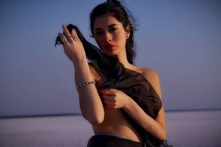 Pretty naked girl on the salt flatの写真素材