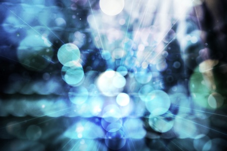 abstract background - de-focused lights on cyan backgroundの写真素材