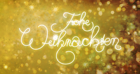 Merry Christmas in German, vintage calligraphy style lettering. Christmas card design with different textures and shapes in golden colorsの写真素材