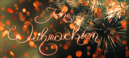 Merry Christmas in German, vintage calligraphy style lettering. Christmas card design with different textures and shapes in red golden colorsの写真素材