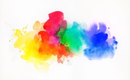 Bright rainbow colored watercolor paints and different colorful textures combined and isolated on white paper. Art, craft, creativity, concept, background.の写真素材