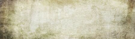 Old grungy wall, stone and concrete textures background in sepia, gray and brown tones. Abstract backdrop texture motif.の写真素材