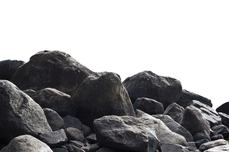 Heap of dark stones isolated on white background.の写真素材