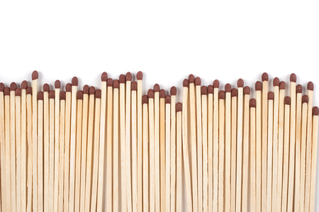 Matches in a row on white background.の写真素材
