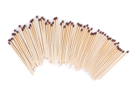 Matches in a row on white background.の写真素材