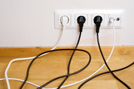 Electric and aerial outlet sockets, electric plugs and cables.の写真素材