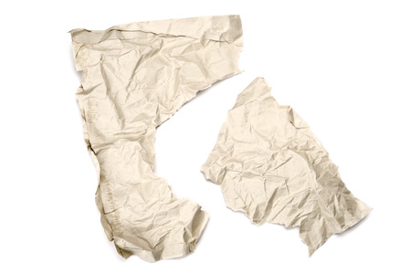 Wrinkled and torn paper on white background.の写真素材