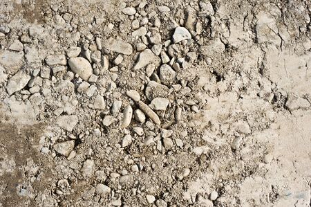 Close-up of sand and gravel texture.