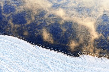 River water freezing on a very cold winter day