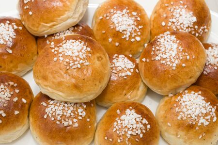 Freshly baked sweet buns, sugar coated.の写真素材