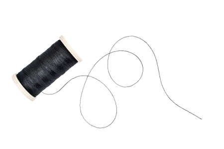 Spool of sewing thread on white background.の写真素材