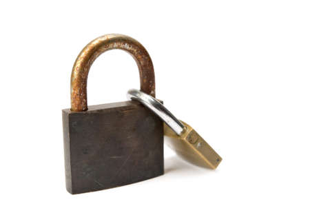 Closed padlocks together on white background.の写真素材