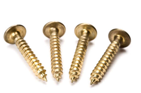 Screws on white background. Selective focus.の写真素材
