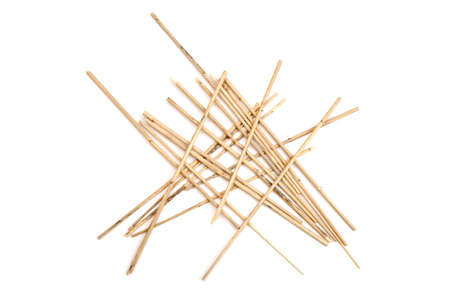 Pile of dried reeds on white background.