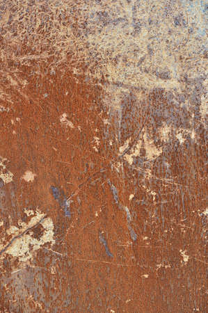 Metal plate filled with scratches and rust