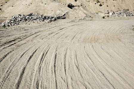 Tire tracks in the sand.の写真素材