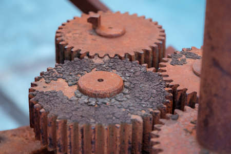 Rusted iron industrial equipment, cogs and gearsの写真素材